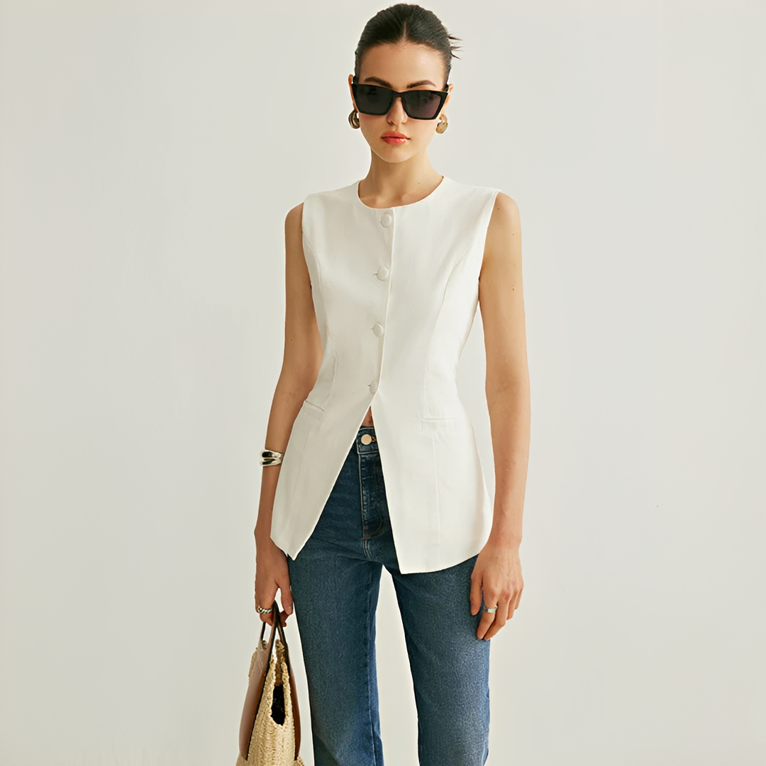 Colete feminino elegante e versátil sem mangas, perfeito para moda casual primavera/verão.