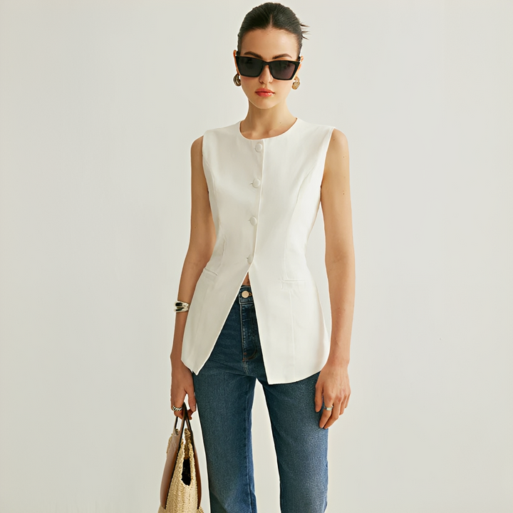 Colete feminino elegante e versátil sem mangas, perfeito para moda casual primavera/verão.