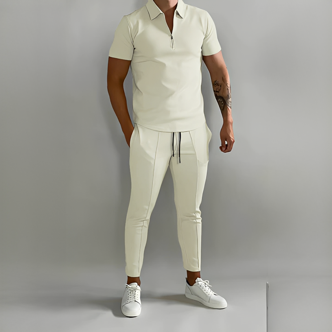 Conjunto de verão masculino casual com camisa leve e calça, ideal para dias quentes e look descontraído.