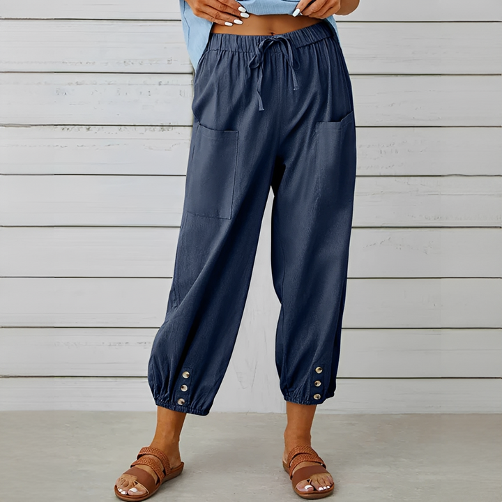Calça feminina perna larga para o verão, cintura alta. Peça versátil, elegante e confortável.