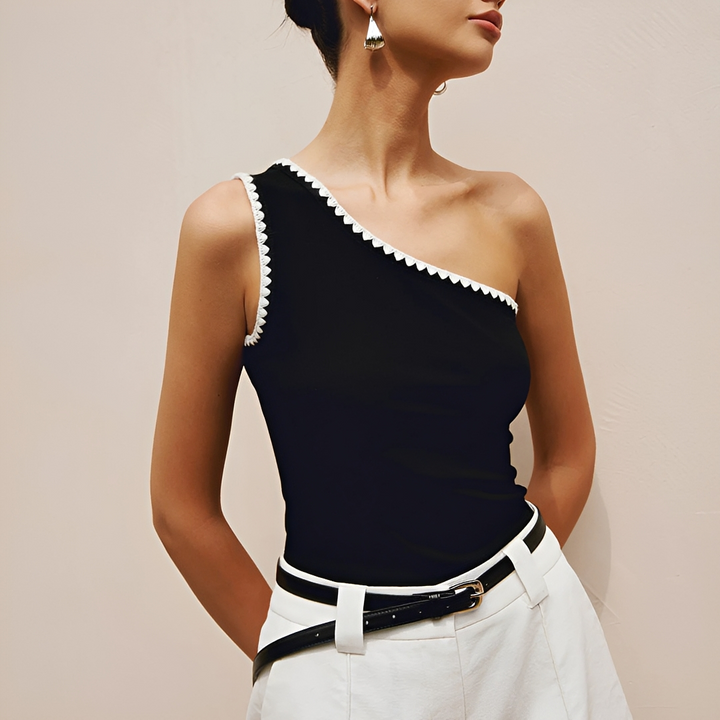 Top feminino um ombro só, elegante e moderno. Ideal para moda casual e looks de verão, com caimento slim e versátil.