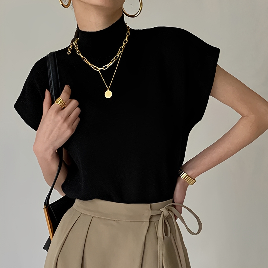 Blusa feminina de gola alta confortável, ideal para o outono. Um top versátil para looks casuais e elegantes.