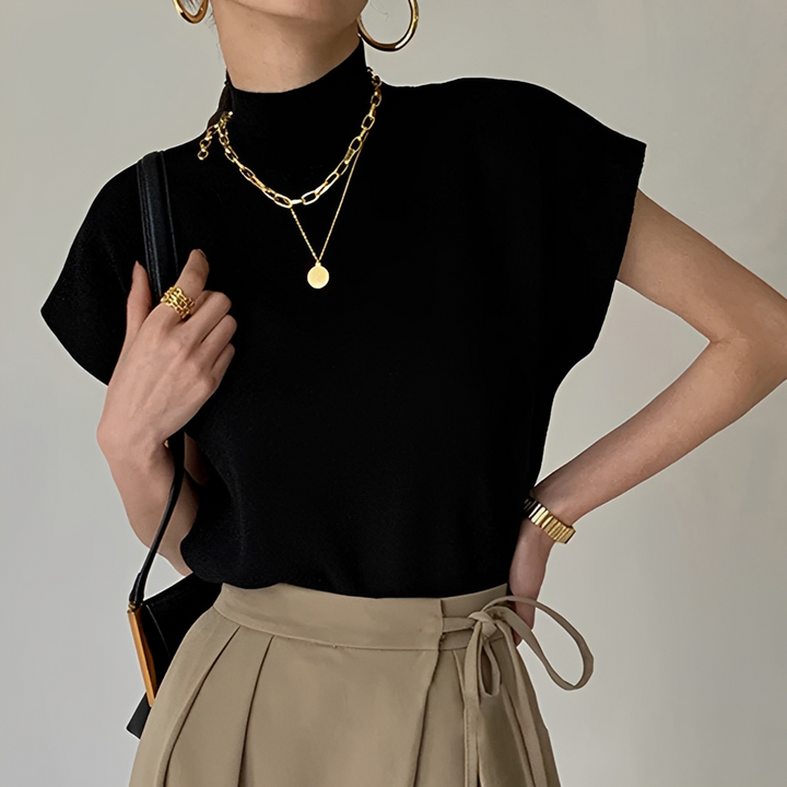 Blusa feminina de gola alta confortável, ideal para o outono. Um top versátil para looks casuais e elegantes.
