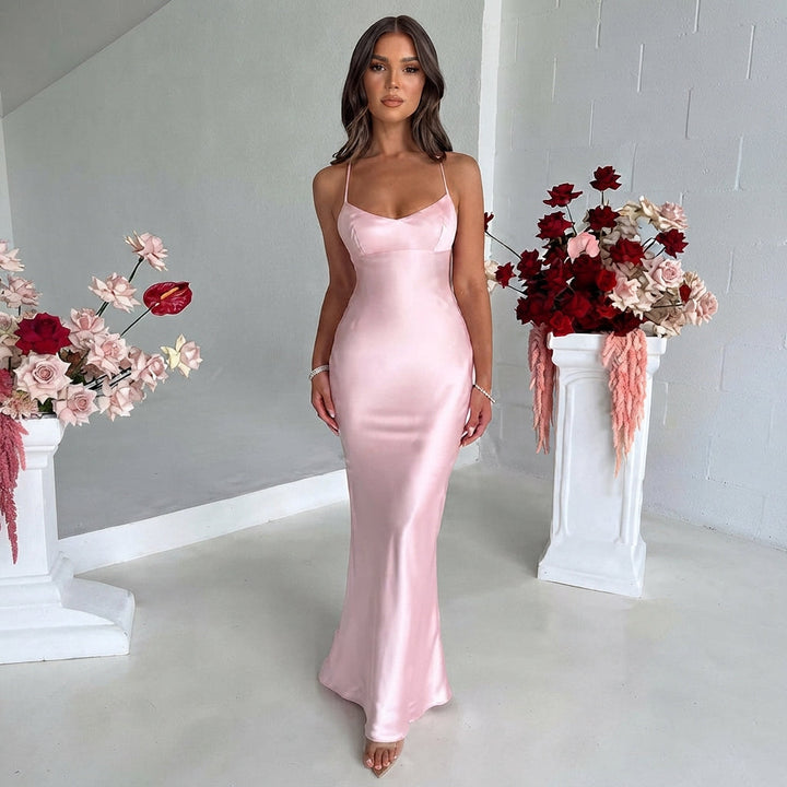 Vestido maxi feminino rosa brilhante para festa de verão. Elegante, longo e ajustado para ocasiões especiais.