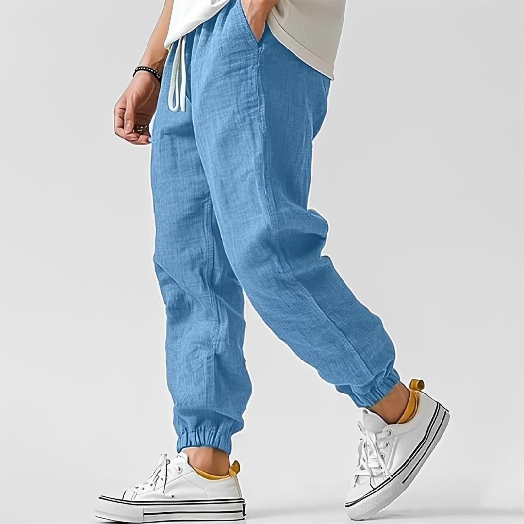 Calça masculina slim fit para verão, design moderno e com caimento impecável. Conforto e estilo.