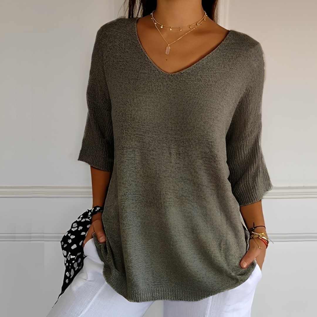 Suéter feminino longo Melodia, com toque macio e caimento elegante. Blusa confortável.