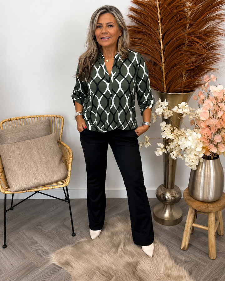Blusa feminina elegante estampada de manga longa para outono, perfeita para um estilo casual chic e versátil.