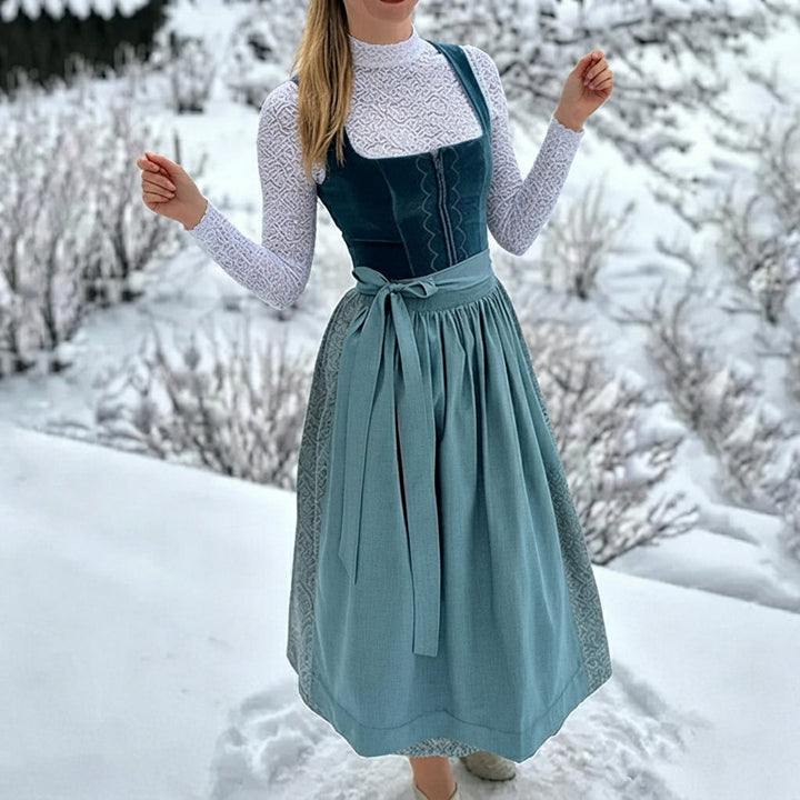 Dirndl feminino tradicional azul marinho com corpete bordado para festas e eventos bávaros. Vestido de festa sazonal.