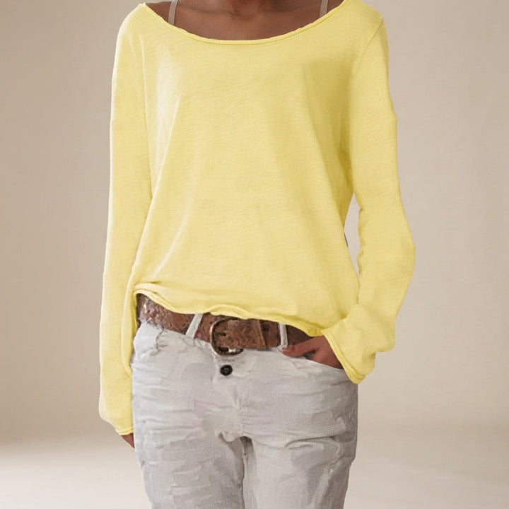 Camisa feminina casual, corte solto, manga comprida, elegante e confortável para moda do dia a dia.