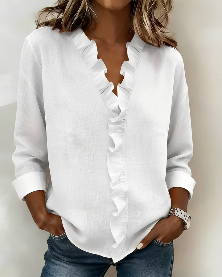 Blusa feminina versátil de manga longa, decote V, perfeita para outono e primavera, com estilo casual ou trabalho.