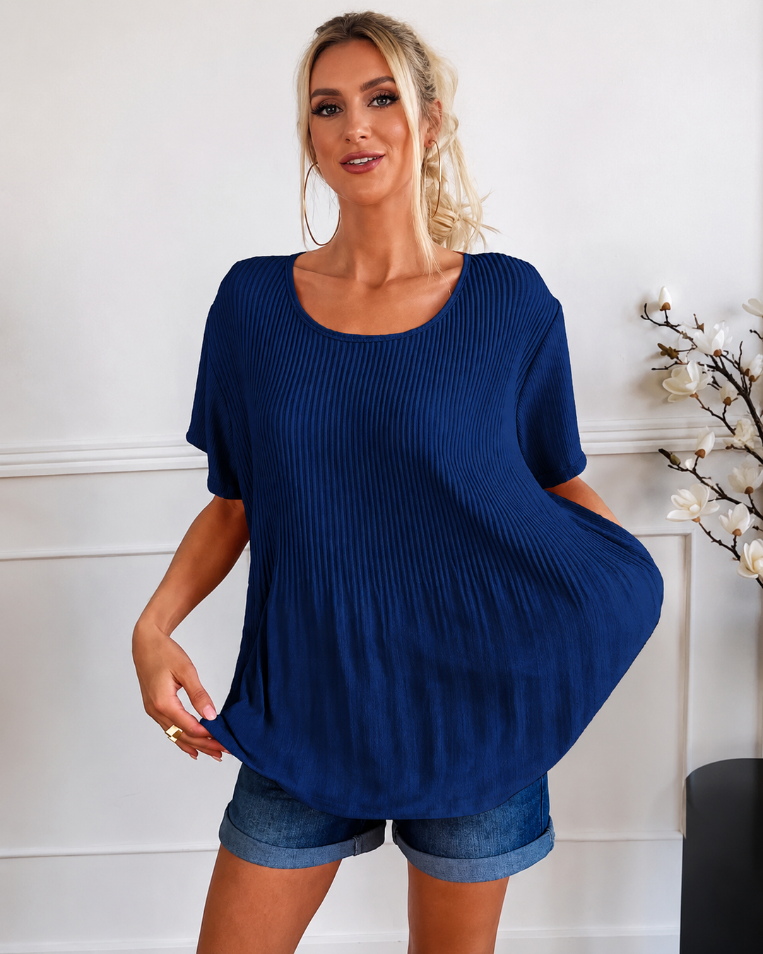 Blusa feminina plissada, um toque de elegância e conforto para seu guarda-roupa de verão. Estilo versátil.