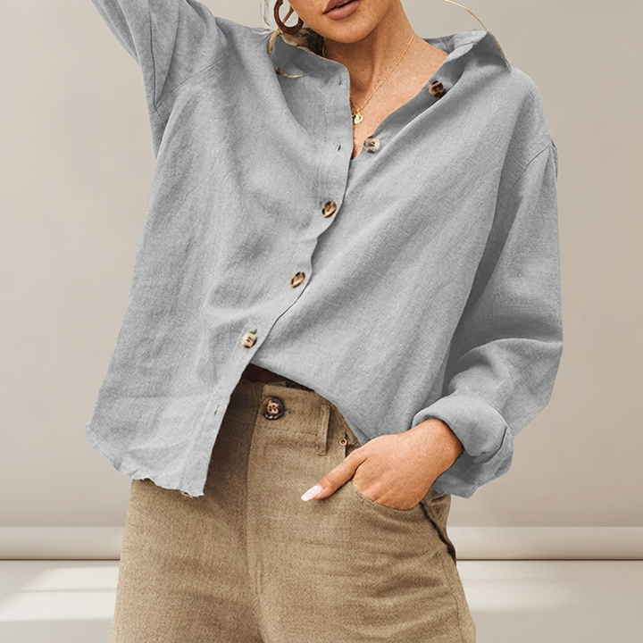 Blusa feminina elegante com botões frontais. Camisa versátil para moda primavera-verão, combina com diversos looks.