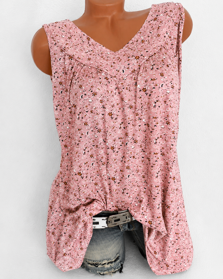 Top feminino fluido e fresco, sem mangas, perfeito para dias quentes de verão. Conforto casual.