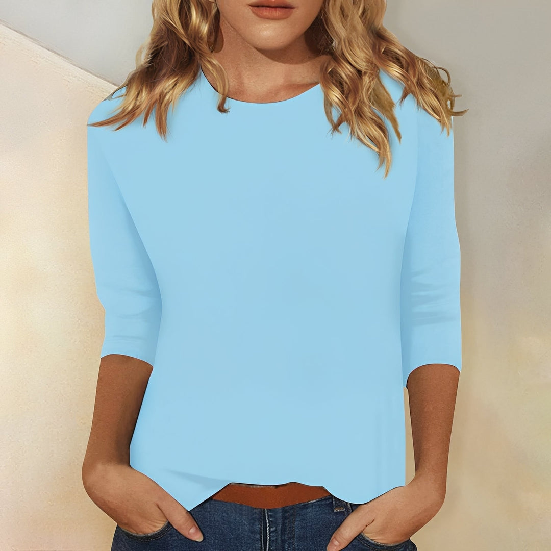 Blusa feminina casual e confortável com manga 3/4, perfeita para o dia a dia e moda verão.