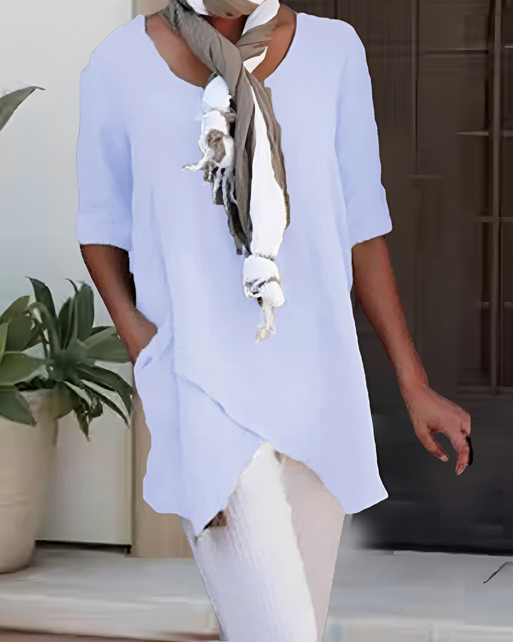 Camiseta feminina elegante gola redonda, ideal para looks versáteis de primavera verão, combinando conforto e estilo.