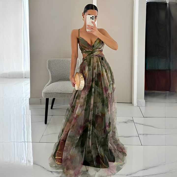 Vestido maxi feminino fluido e elegante, com cintura cruzada. Perfeito para o verão, festa ou uso casual chic.