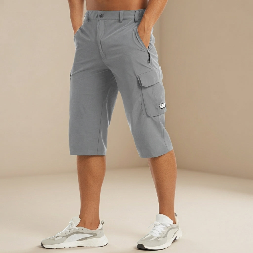 Shorts masculinos cargo flexíveis e casuais, proporcionando conforto e estilo para suas viagens de verão com bolsos.