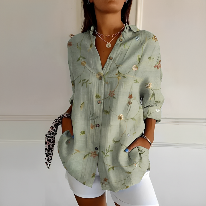 Blusa feminina floral Eleanor, leve e versátil, perfeita para o clima de primavera-verão, estilo moderno.