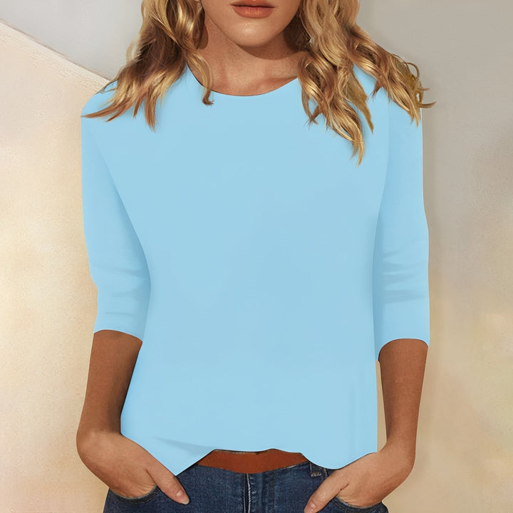 Camiseta feminina básica de manga longa com gola redonda, confortável e versátil para o dia a dia.