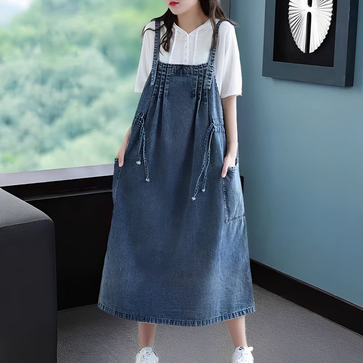 Vestido midi jeans feminino plus size, casual e confortável, com bolsos laterais, ideal para a moda verão.