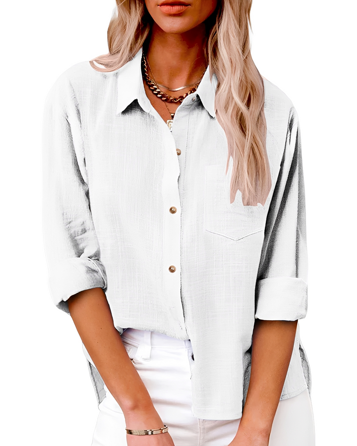 Blusa feminina elegante e versátil com botões, perfeita para moda casual ou formal.