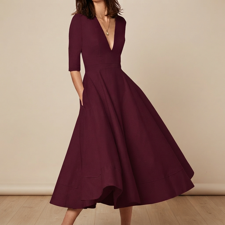 Vestido midi feminino com decote V, tecido leve e confortável para o verão. Moda elegante e casual feminina.