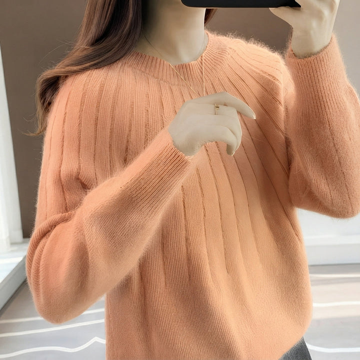 Suéter feminino de tricô macio e quente. Pullover confortável e elegante, essencial para o frio do inverno e outono.