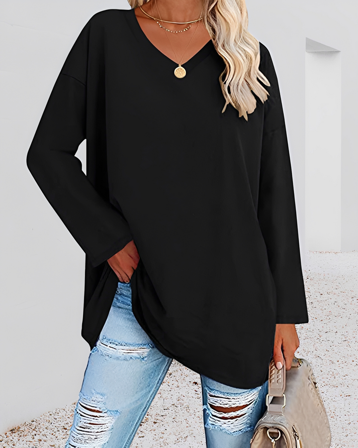 Blusa feminina de manga longa com decote V, estilo casual chique e caimento solto para moda diária.
