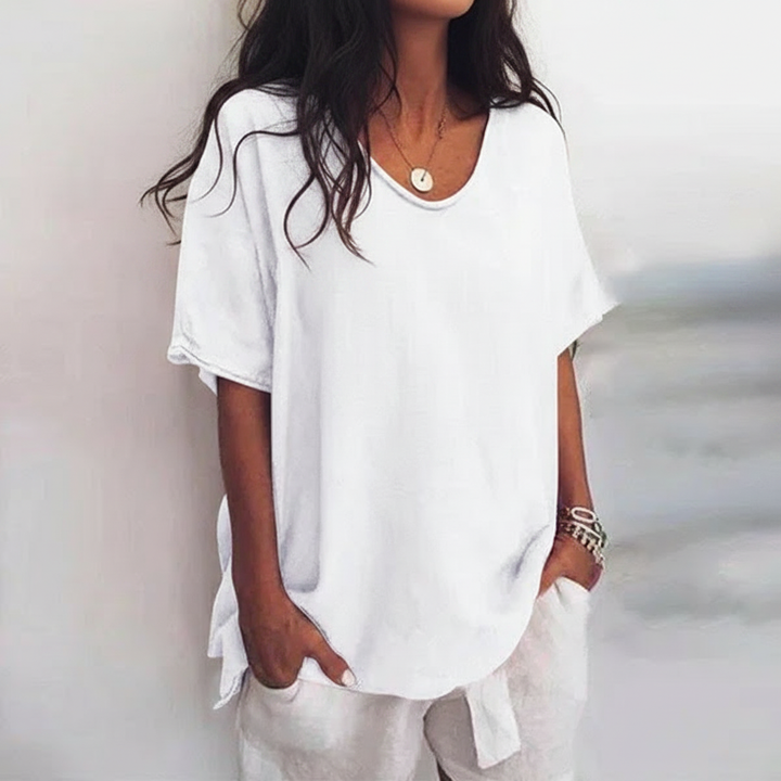 Blusa feminina casual Aurora, gola redonda, peça versátil para moda feminina e uso diário.