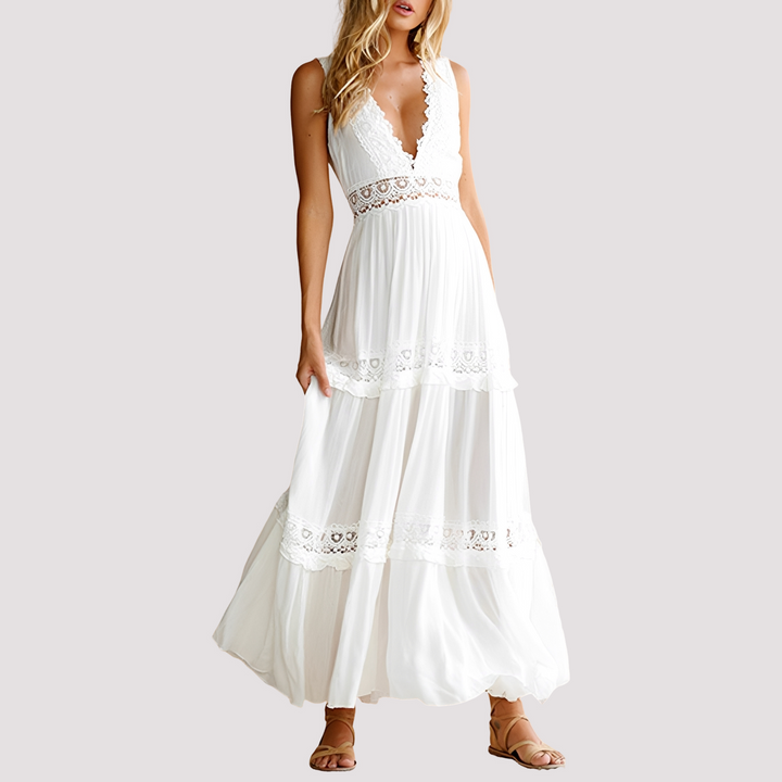 Vestido midi feminino elegante para verão, sem mangas. Ideal para look casual ou diário. Disponível em preto e branco.