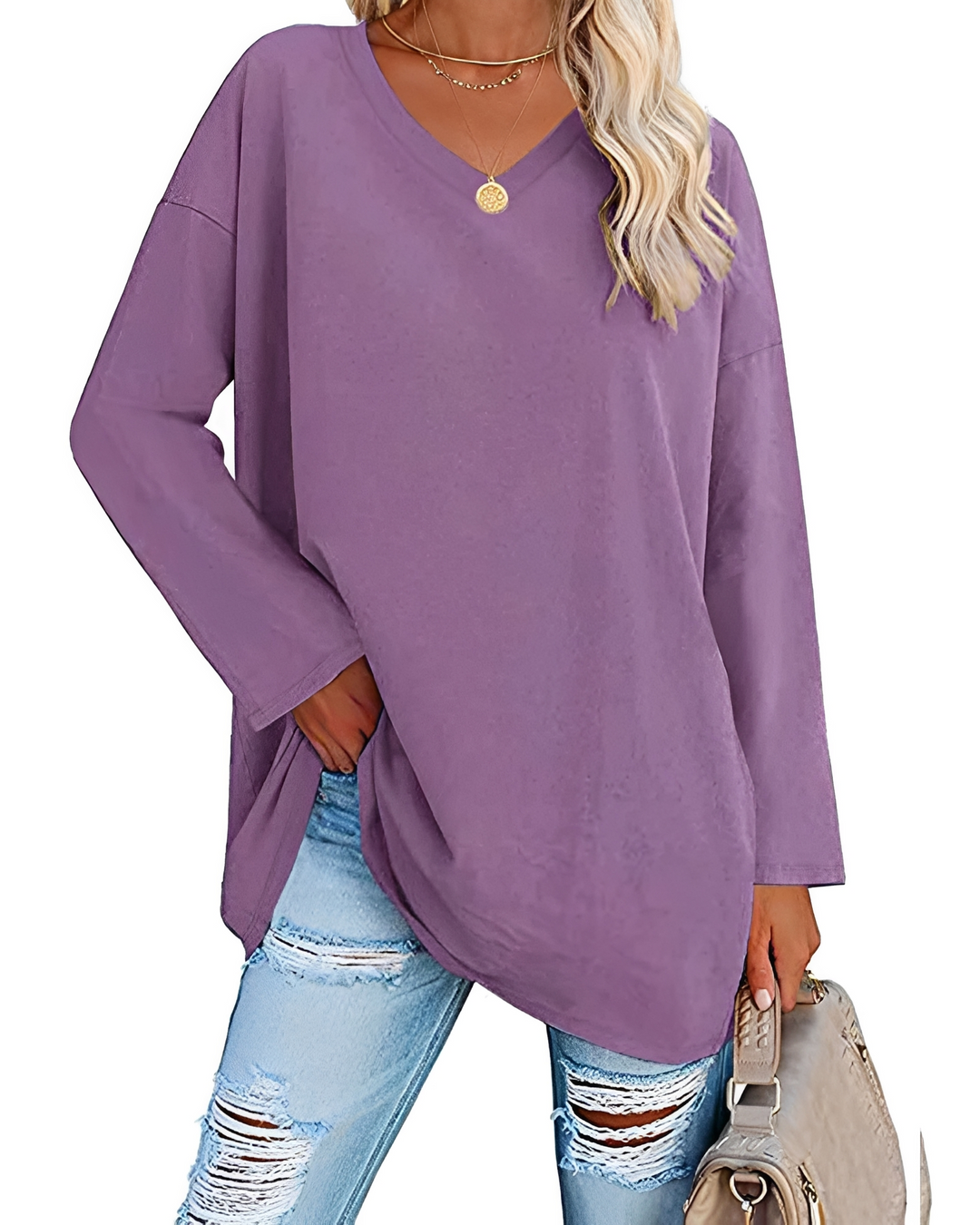 Moda feminina: Camisa solta com decote V, manga longa, que combina conforto e estilo casual elegante.