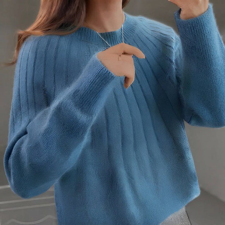 Moda feminina: Suéter de tricô confortável e elegante. Pullover ideal para dias frios de inverno e outono.