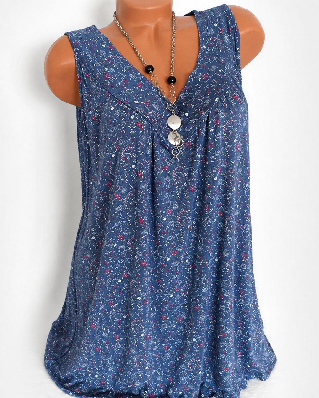 Top fluido feminino sem mangas para o verão. Decote V e estampa. Moda fresca e casual.