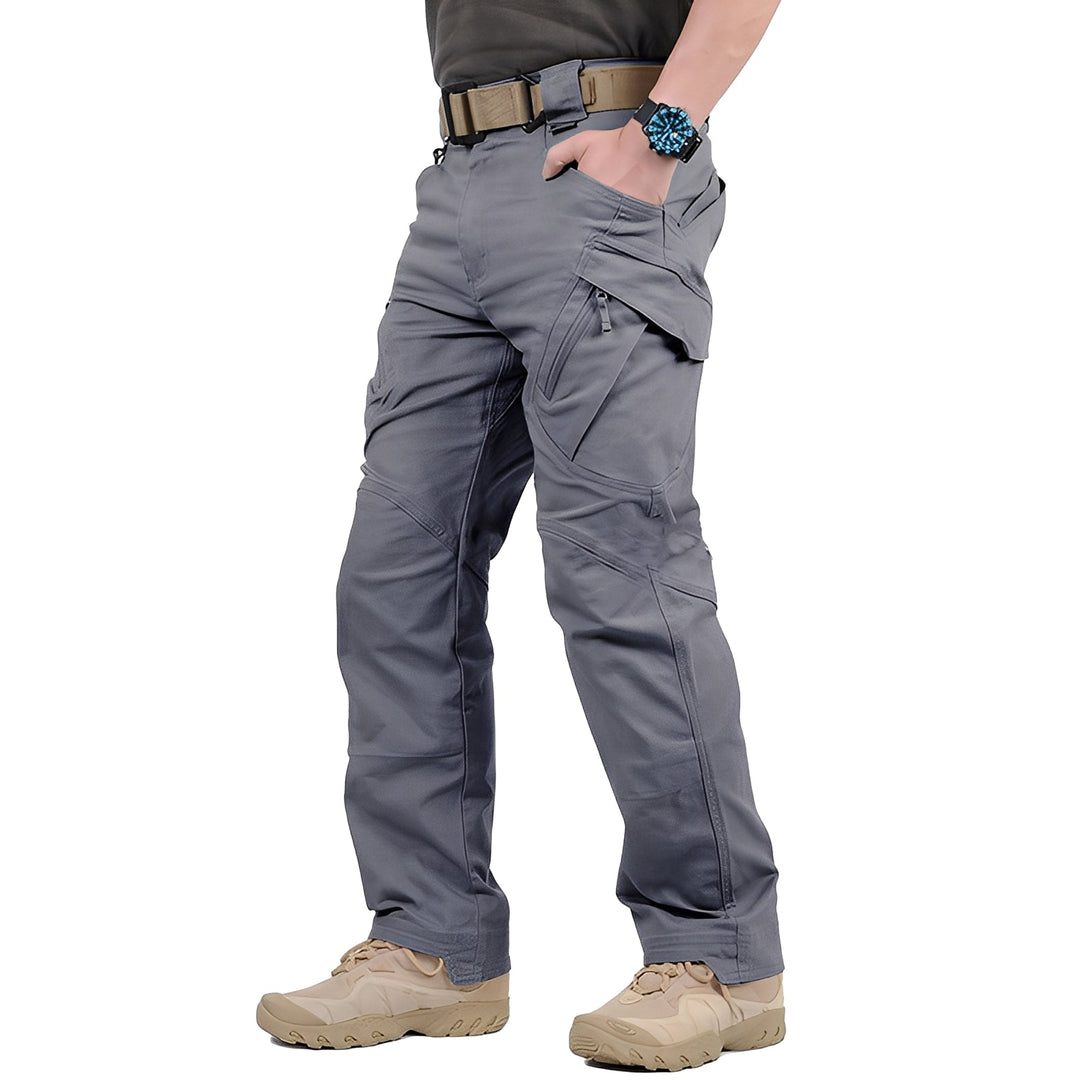 Calça masculina cargo tática militar, ideal para outono/inverno. Conforto e resistência para lazer e atividades diárias.