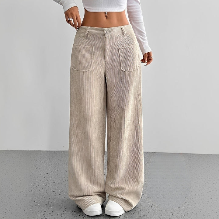 Calça feminina casual de cintura alta, ideal para looks diários de primavera/outono. Estilo e conforto versátil.