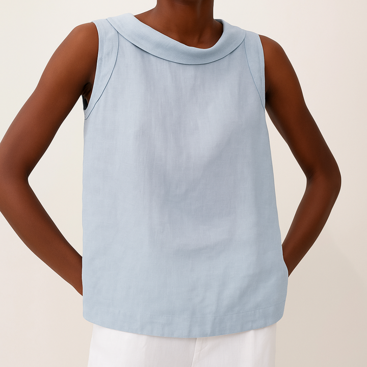 Top feminino moderno e versátil, sem mangas. Peça essencial para a moda feminina casual e elegante.