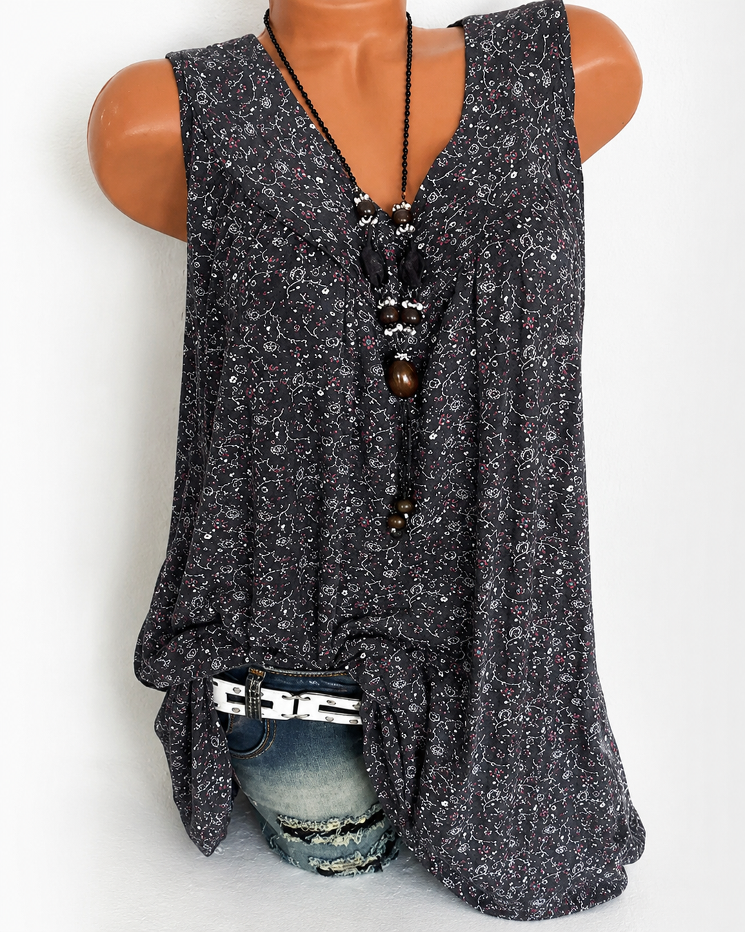 Tops femininos fluidos sem mangas para o verão. Estilo casual e versátil com estampa.