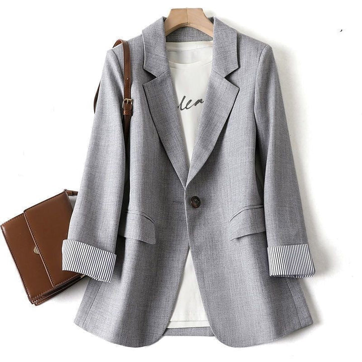 Blazer feminino Nettie chic em preto, cinza ou bege. Casaco elegante e formal para trabalho e eventos sociais.