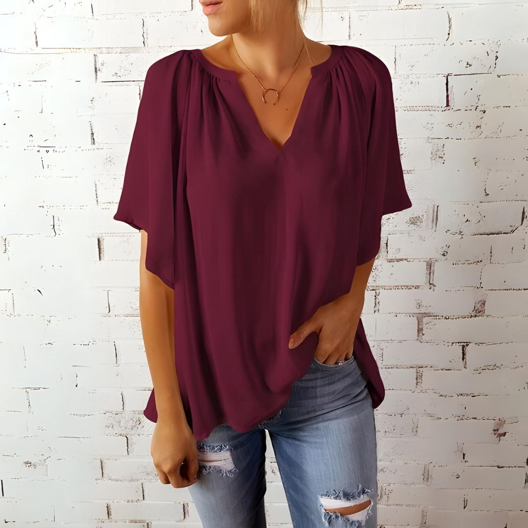 Elegante blusa feminina decote V, mangas fluidas, moda primavera verão. Perfeita para um toque de estilo.