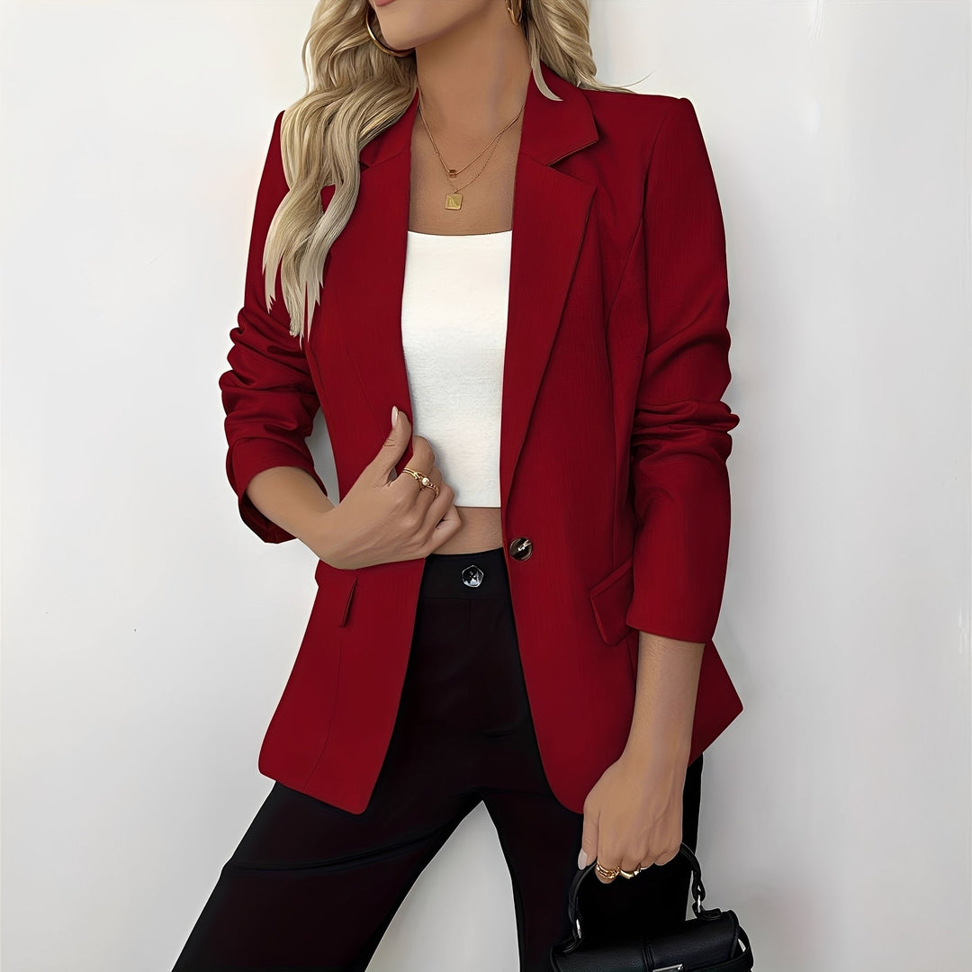 Elegante blazer feminino com gola lapela, disponível em diversas cores. Ideal para um look moderno e formal.