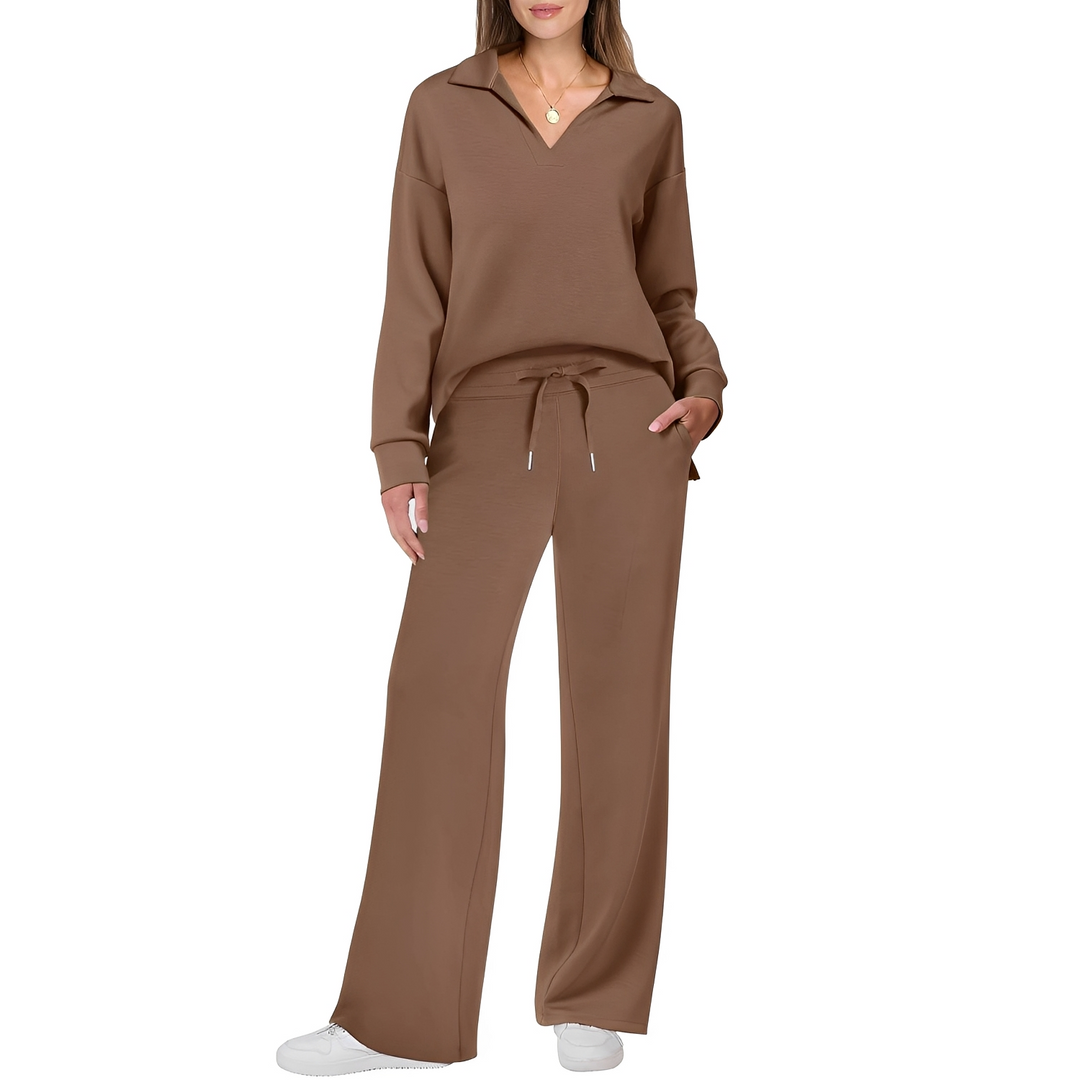 Suéter e calças femininas em conjunto casual, criando um visual completo, moderno e muito confortável.