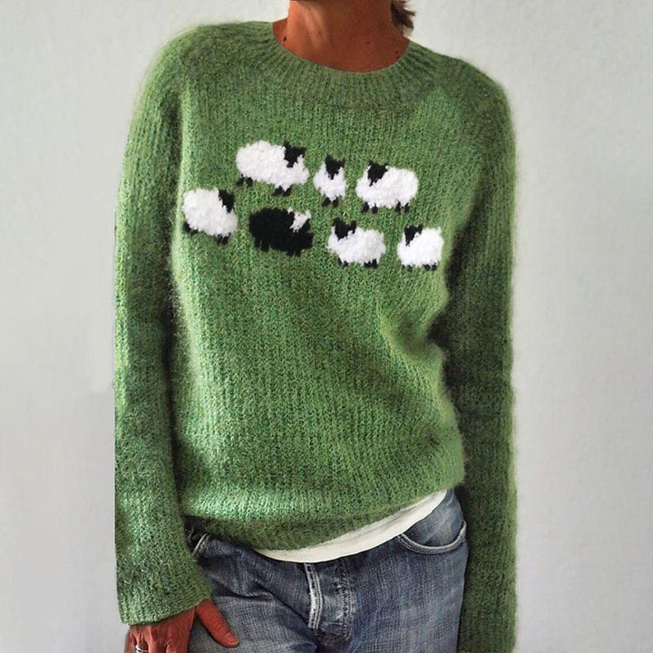 Camisola feminina estampada de manga comprida em tons de verde e cinzento. Peça versátil e elegante para o outono inverno.