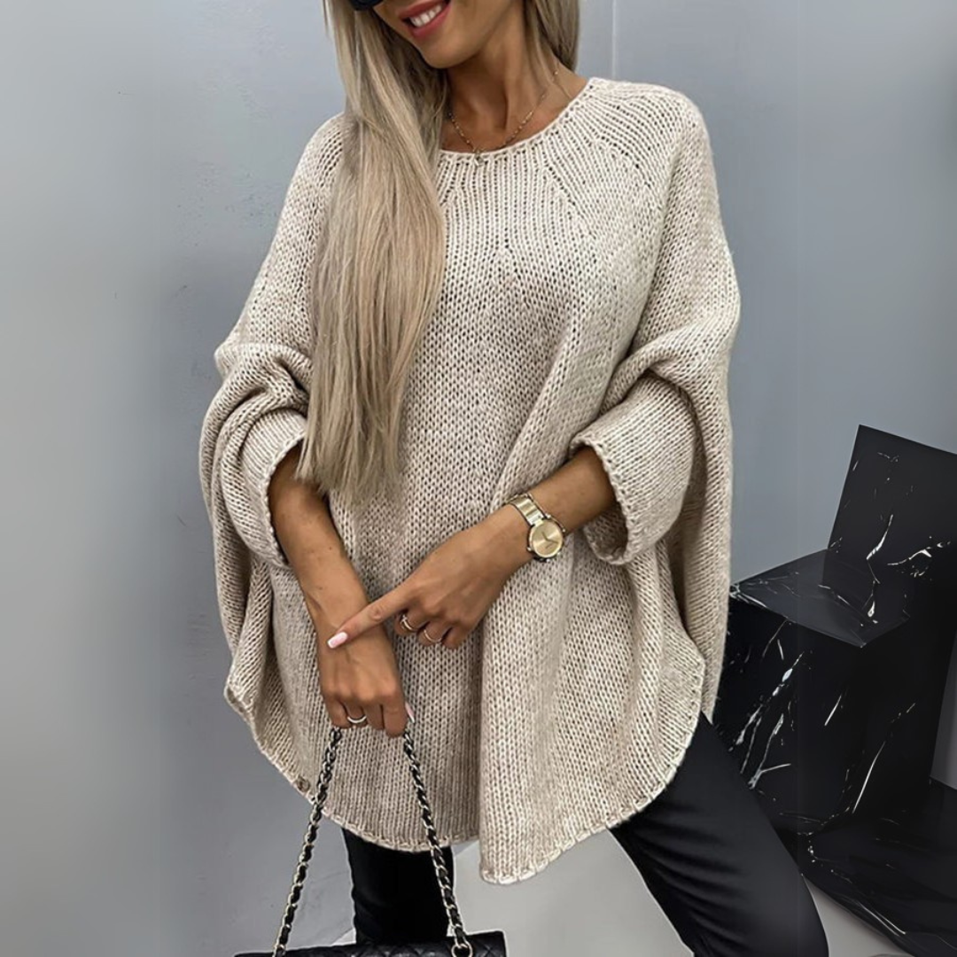Suéter feminino elegante de gola redonda, ideal para conforto e estilo casual no outono e inverno.