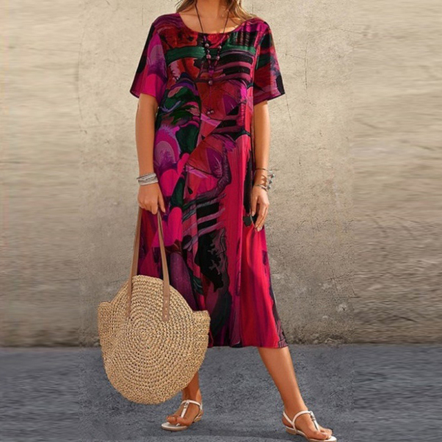 Maxi vestido feminino abstrato colorido, perfeito para primavera/verão. Estampa casual e moda confortável.
