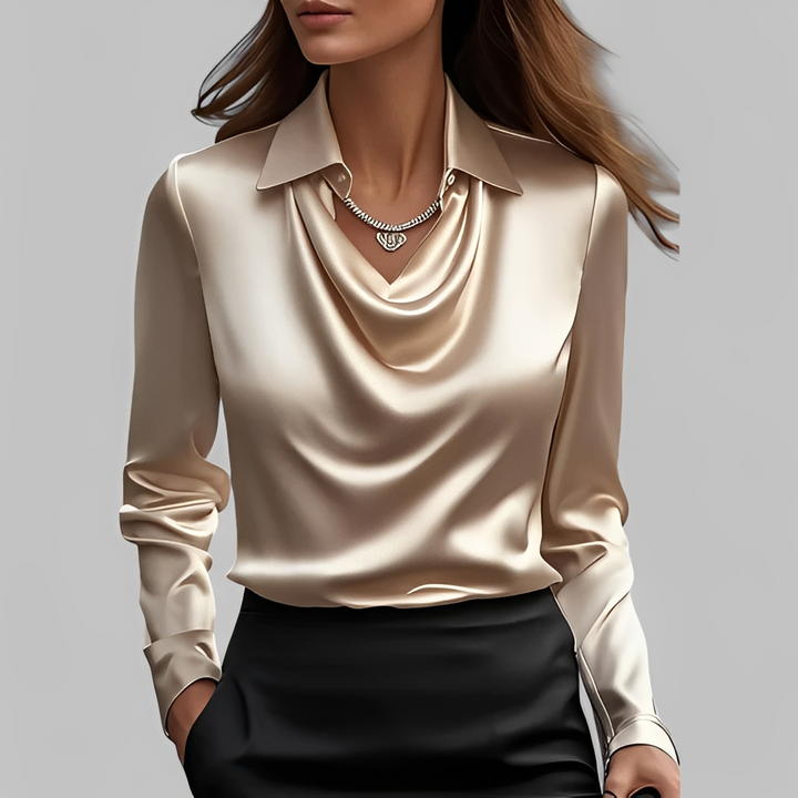 Blusa social feminina Scarlett, elegante e moderna, ideal para o trabalho ou eventos especiais.