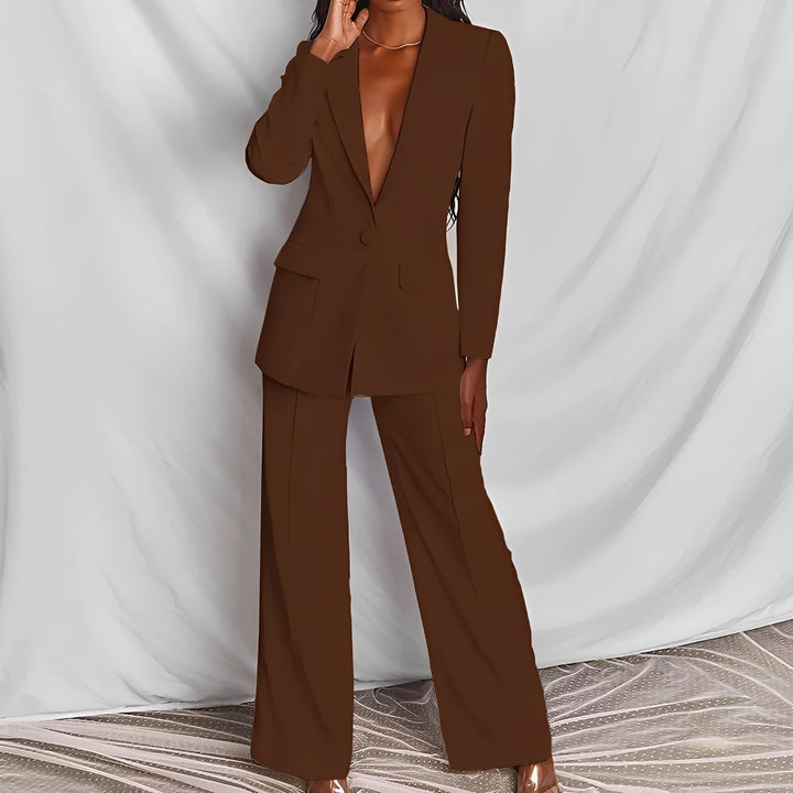 Conjunto feminino de blazer e calças sociais. Caimento elegante, look profissional e sofisticado moda mulher.