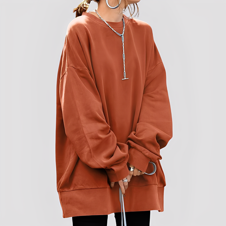 Suéter feminino oversize Estella versátil para looks modernos de outono e inverno, ideal para o dia a dia.
