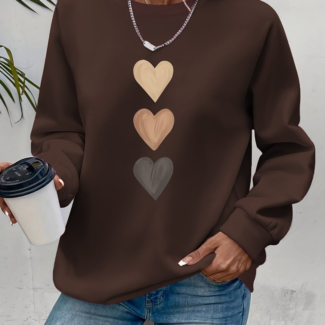 Moda feminina: camisola Amara com corações, perfeita para adicionar estilo e aconchego ao seu guarda-roupa.