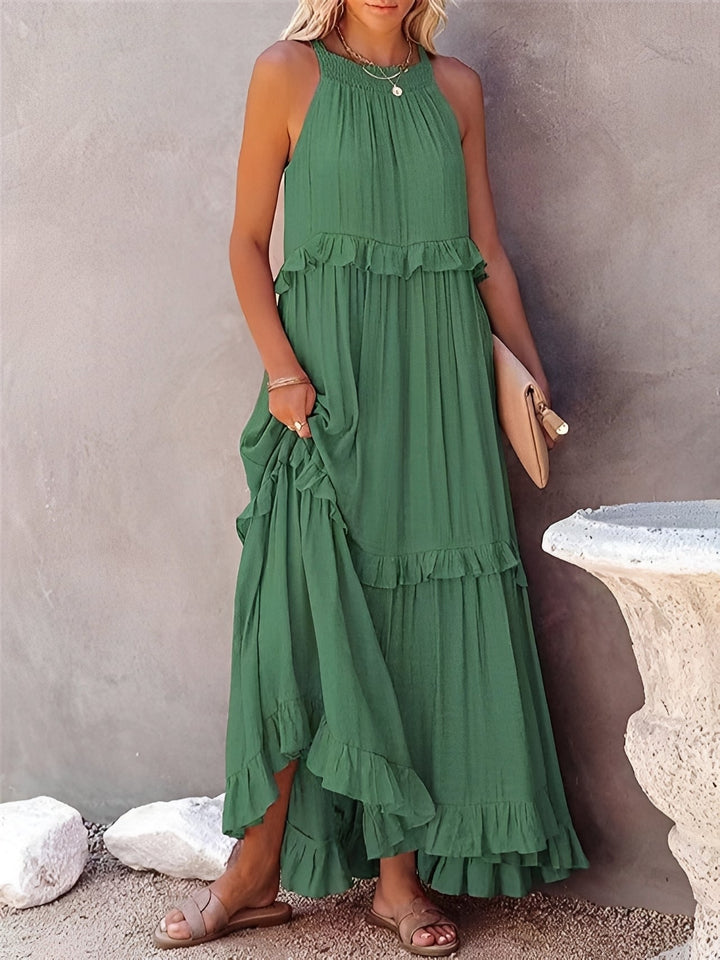 Roupa feminina: Vestido Zanna sem mangas, com babados. Elegância e conforto para o dia a dia e eventos.