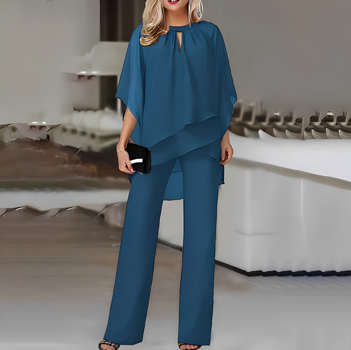 Blusa elegante e calça larga formam um conjunto feminino chique. Ideal para trabalho e eventos, primavera verão.